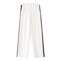 Détail du pantalon blanc à jambes larges avec bandes latérales noires et bouton à la taille - S / Bas / Noir et Blanc