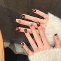 Berry red French press-on nails with bow rhinestones and black gem accents - Extra Small (XS)