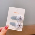 Barrettes de Noël avec pompons blancs en fausse fourrure et strass flocon rose - Flocon de neige