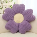Purple flower plush cushion in soft teddy velvet on sofa, macaron home decor accent - Purple