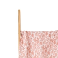Infant swaddle blanket featuring a soft coral pink leaf print on breathable gauze fabric - Coral Pink Leaves (S139)