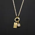 Vergulde roestvrijstalen ketting met letter D bedeltje en vierkante strass hanger - Letter D (XNL0116) / Goud