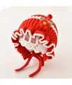 Detailed view of red knitted baby hat with white crochet trim and floral accents - 3M-2Y / Red