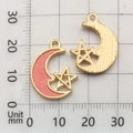 Pink enamel and gold star-moon charms for DIY jewelry on a measurement grid scale - Pink Enamel Moon and Star (13344)