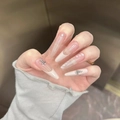 Close-up of French gradient press-on nails with silver crosses and rhinestone accents - By1583 Elegant And Graceful / Glue Type
