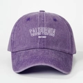 Detailed shot of purple washed cotton baseball cap with white CALIFORNIA embroidery - One Size / Dark Purple