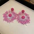 Handgemaakte geweven bloemoorbellen in roze stof met een floraal vuurwerkontwerp - Roze