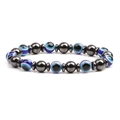 Macro detail of 8mm magnetic hematite beads and blue evil eye charms on elastic bracelet - Round Evil Eye Beads