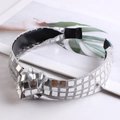 Detail of silver sequin headband with checkered mirror finish and a stylish front knot - Silver