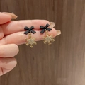 Elegant gold snowflake earrings with black matte bows and sparkling crystal accents - No.31 Black Bow Snowflake (XXX6030)