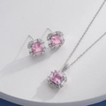 Detail of silver jewelry set with square pink gemstones and sparkling halo accents - Silver Square Pink (HQ0001(19))