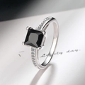 Minimalist S925 silver ring with a square black zircon stone and side diamond accents - Black Zirconia