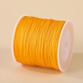 0.8mm vibrant orange braided nylon cord on a spool for DIY jewelry and necklaces - Orange