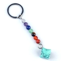 Seven chakra keychain featuring colorful crystal beads and a turquoise star pendant - Blue Turquoise (Synthetic)