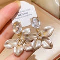 Macro detail of gold plated flower earrings with pearls and large faceted crystal - 7# Gold Pearl Flower Pendant Studs