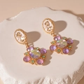 Close-up of vintage gold portrait relief earrings with colorful crystals and white accents - Purple Flower Portrait Style (S925 Silver Pin)