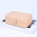 Elegant light apricot PU leather jewelry travel case with secure silver metal snap closure - Double Layer Portable / Nude