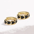 Close-up of golden hoop earrings featuring a series of black heart-shaped enamel inlays - Heart Embroidery Black