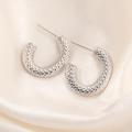 Elegant silver C-shaped earrings with unique honeycomb texture on cream velvet background - C-Shape Scale Texture Earrings (0225)