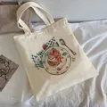 Beige canvas tote bag featuring afternoon tea strawberry cake print on a fabric background - C6 Afternoon Tea Cake