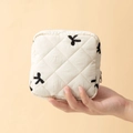 Quilted cream sanitary napkin storage pouch with black bow embroidery and zipper - 12.5*5*12.5cm / Beige