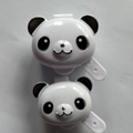 Mini panda-shaped portable condiment bottles for bento boxes in white and black - Panda Bottles Set of 2