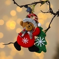 Christmas bear plush hanging ornament wearing red sweater with green tree detail - Bear Hugging Tree