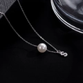 S925 silver necklace featuring a round white pearl and a sparkling letter S pendant - Letter S