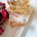 Pince à cheveux noeud en acétate écaille de tortue et bleu clair sur livre rétro - Barrette / Bleu Orange