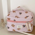 Detail of pink striped quilted makeup bag with teddy bear pattern and fabric label - Makeup Bag / Pink Stripe Bear
