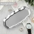 Edelstahl-Schmucktablett in Mondlichtsilber mit gewelltem Rand und Hochglanzpolierung - Welle 22*11cm / Silber