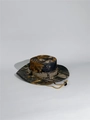 Detail of outdoor tactical boonie hat with breathable metal vents and camouflage pattern - One Size / Jungle Camo IV