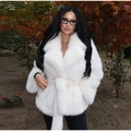 Faux fur coat in white featuring a waist belt and wide lapels for a stylish look - S / White