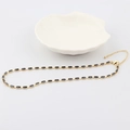 Detail view of a gold-tone necklace featuring rectangular black zircon stones and lobster clasp - Black (2.5*5mm) - Gold Plated
