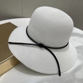 Detail of white woven sun hat with tight straw texture and thin black ribbon accent - M (56-58cm) / White