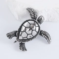 Macro detail of silver sea turtle pendant featuring intricate hexagonal shell patterns - Pendant Only (No Chain) / Steel