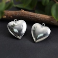 Silver stainless steel heart locket pendant on rustic dark surface with greenery decoration - Heart Smooth Locket 23*25mm / Raw Blank