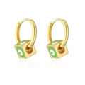 Detailed view of 18K gold plated hoop earrings with green dice charms and eye patterns - Green