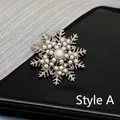 Detailed view of Style A snowflake brooch with golden plating and pearl embellishments - Style A Retro Coffee Gold