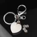 Handmade heart crystal keychain with natural white stone and brown tassel fringe detail - Clear Quartz (Matching Beads)