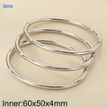 Set da 3 bracciali rigidi ovali in acciaio inossidabile argento 4mm con misura 60x50mm - 3 Anelli (KB205311-LO) / Color Acciaio