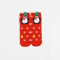 Red Christmas socks featuring cute penguin with green hat and snowflake patterns - One Size / Snowflake Bright Red