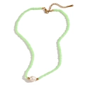 Green beaded necklace with a central white pearl and gold accents for women - Green