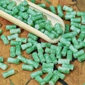 Macro shot of 6x12mm green marble pattern cylinder beads for DIY jewelry making - Jade Cyan (Painted 6x12mm)
