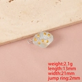 Macro detail of translucent seashell charm with gold accents for DIY jewelry making - Light Green Single Hole (Steel Color Ring)