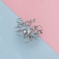 Detailed view of silver stainless steel pinch bails for DIY jewelry necklace making - 3*7mm / Steel