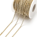 Gold stainless steel DIY chain with alternating white pearls and clear zircons on a spool - 2mm White
