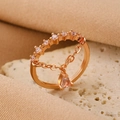 Rose gold minimalist bow ring with shimmering crystals and a pear-cut drop pendant - Rose Gold Pear Chain Ring (S286)