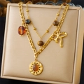 Double-layered gold necklace with sun pendant, tiger eye stone, and bow accessory - Sun Disc Bow Double Layer Style (N3201)