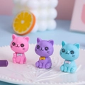 Three cute cartoon cat erasers in pink, purple, and blue colors for students - Cute Cat Shaped Eraser